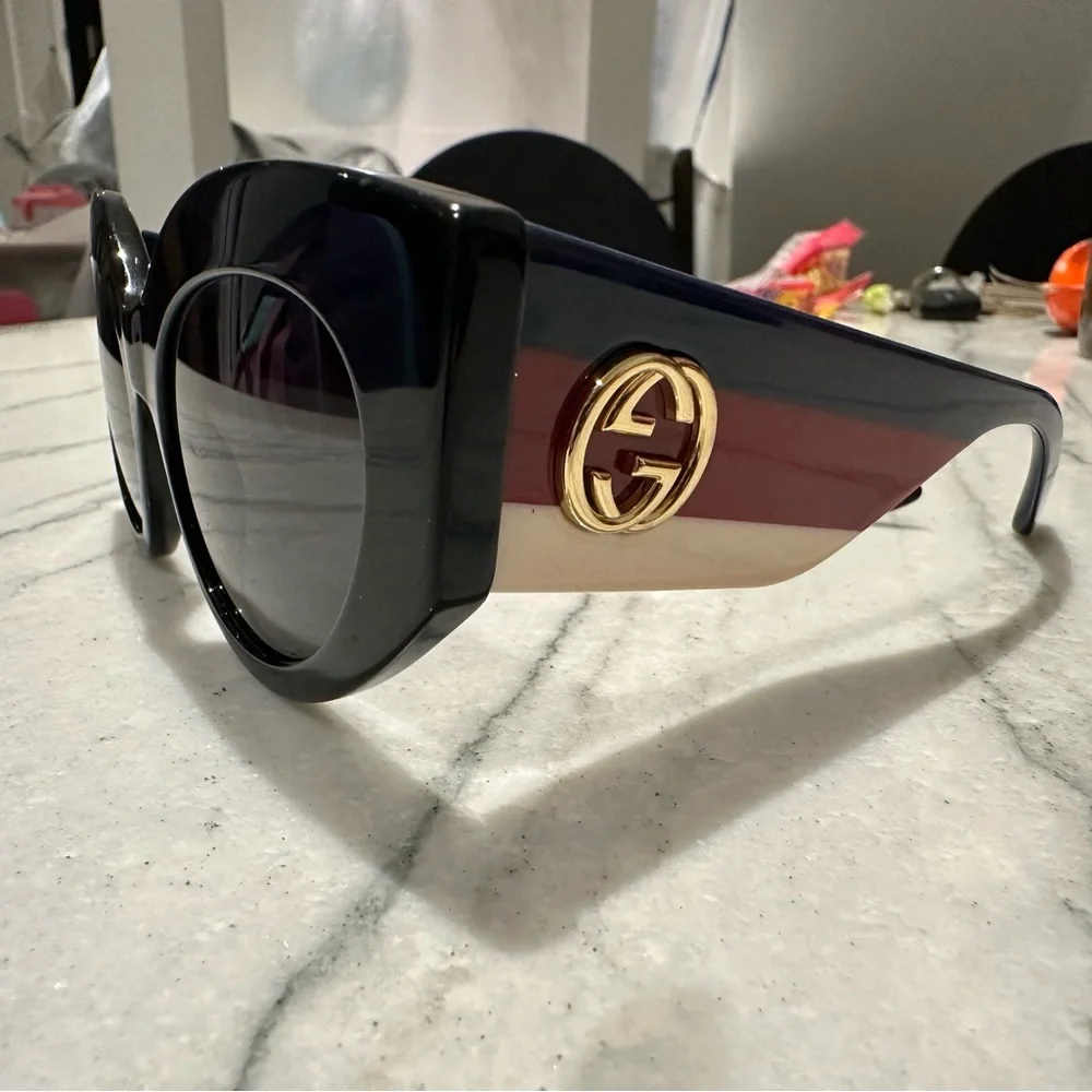 Gucci sunglasses. Thick cat eye frames